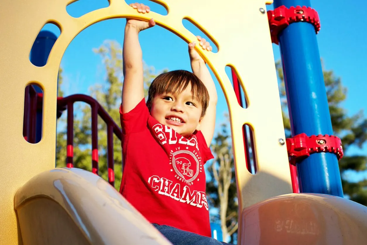 Child playing on playground