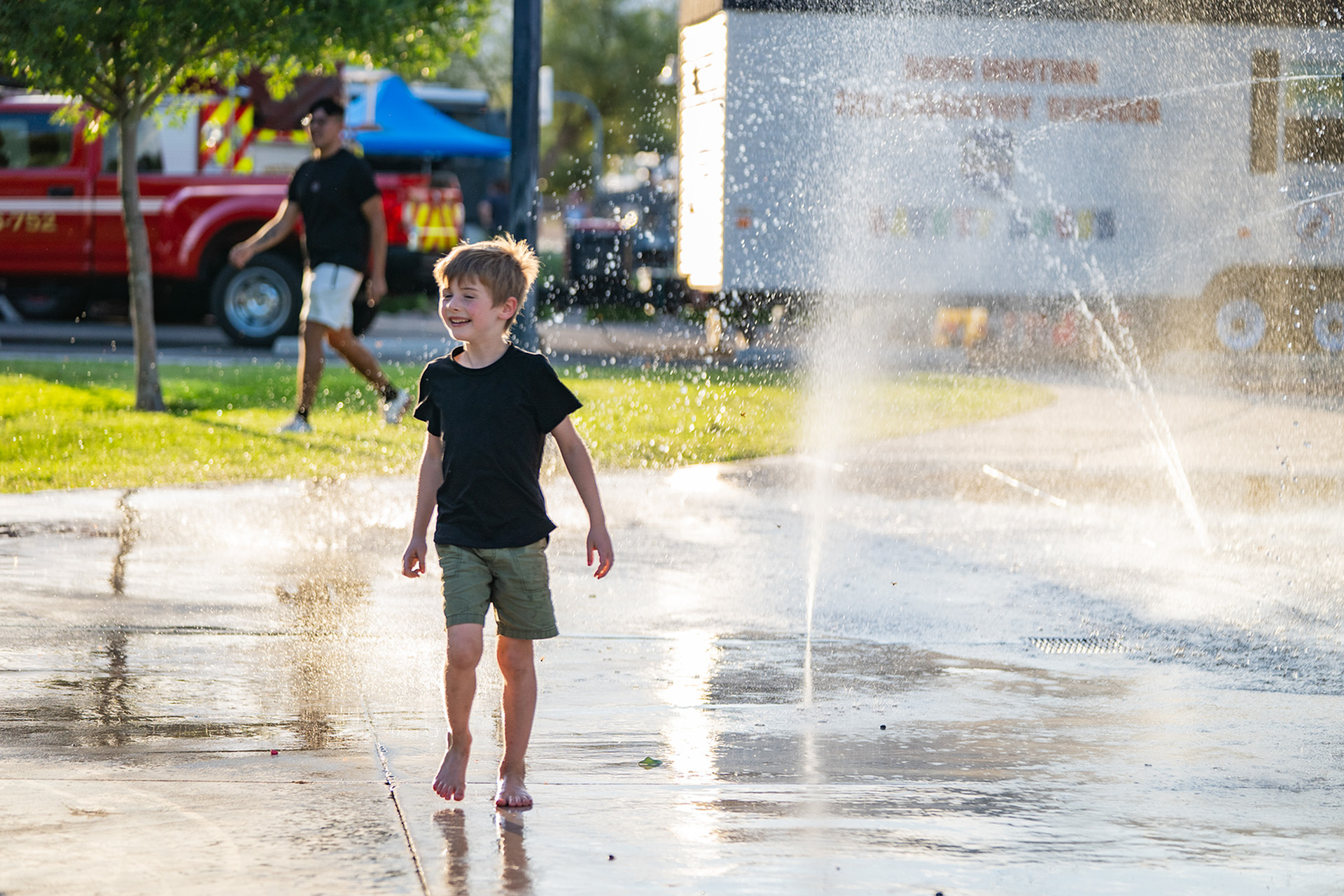 Child playing at splash park