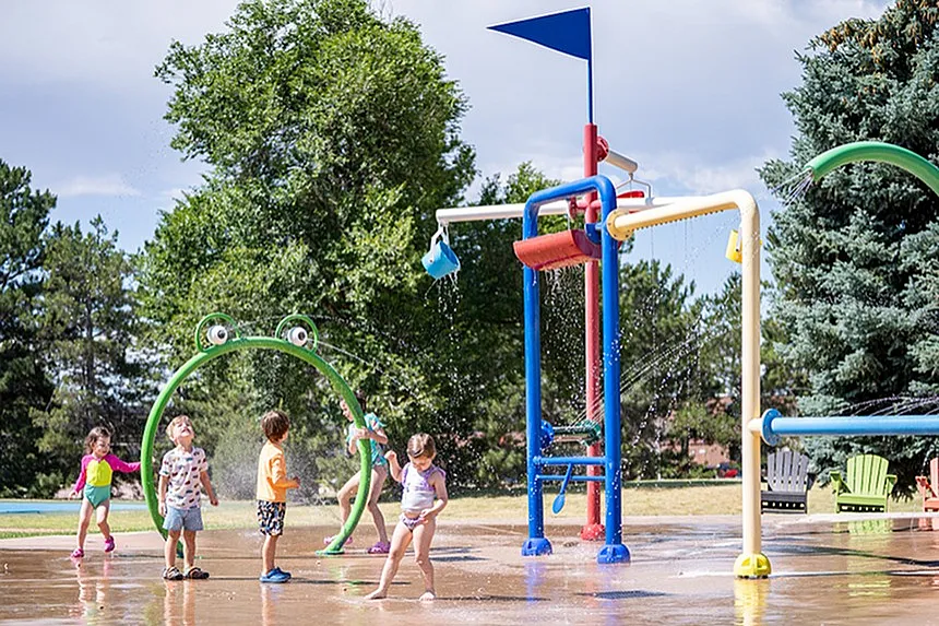 Child playing at splash park