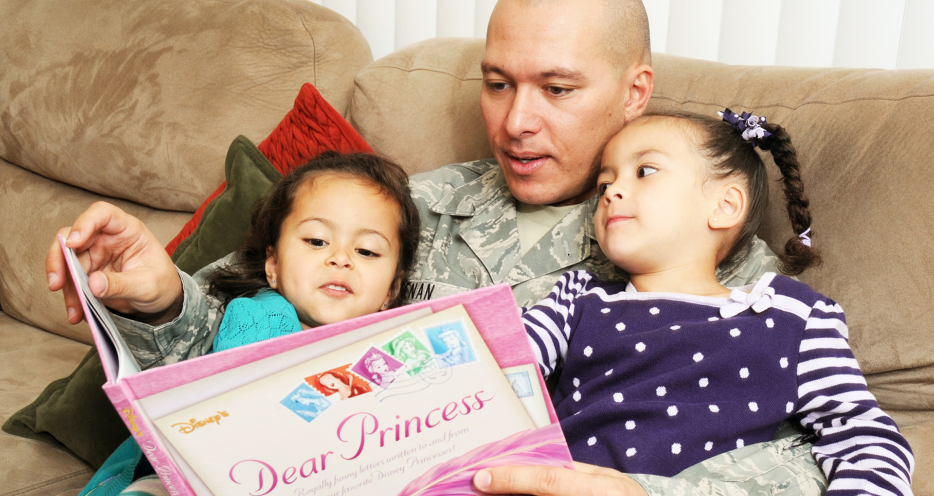 Family reading a book