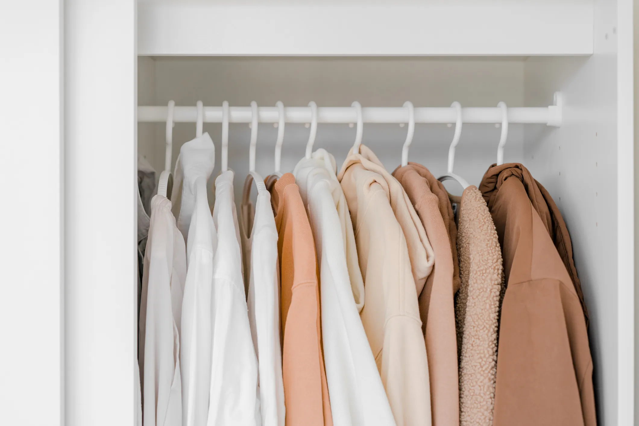 closet storage with clothes