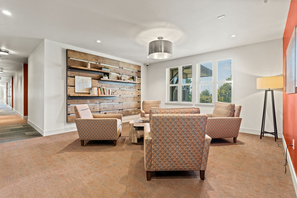 Inviting apartment lounge with comfortable seating and modern decor