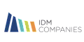 IDM Companies logo with sleek, colorful geometric design.