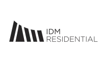 Modern IDM Residential logo featuring sleek architectural lines and bold typography.