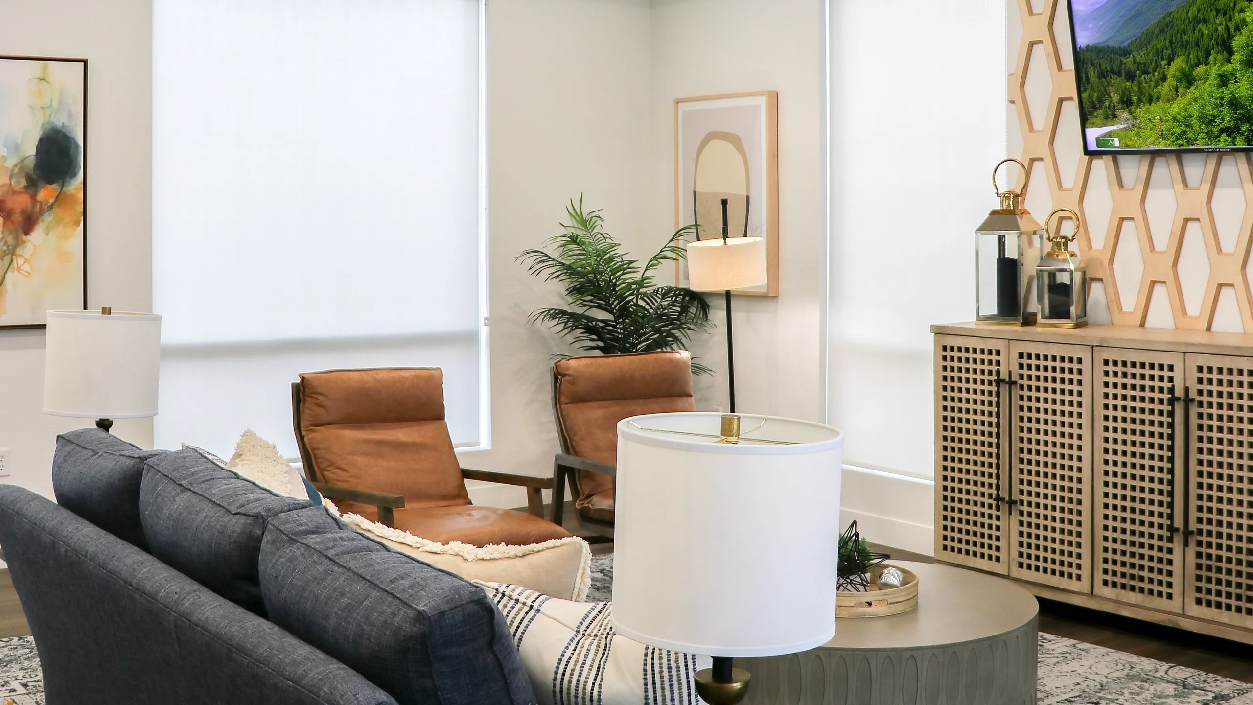 Chic living room featuring modern furniture, stylish decor, and a cozy ambiance with elegant lighting.