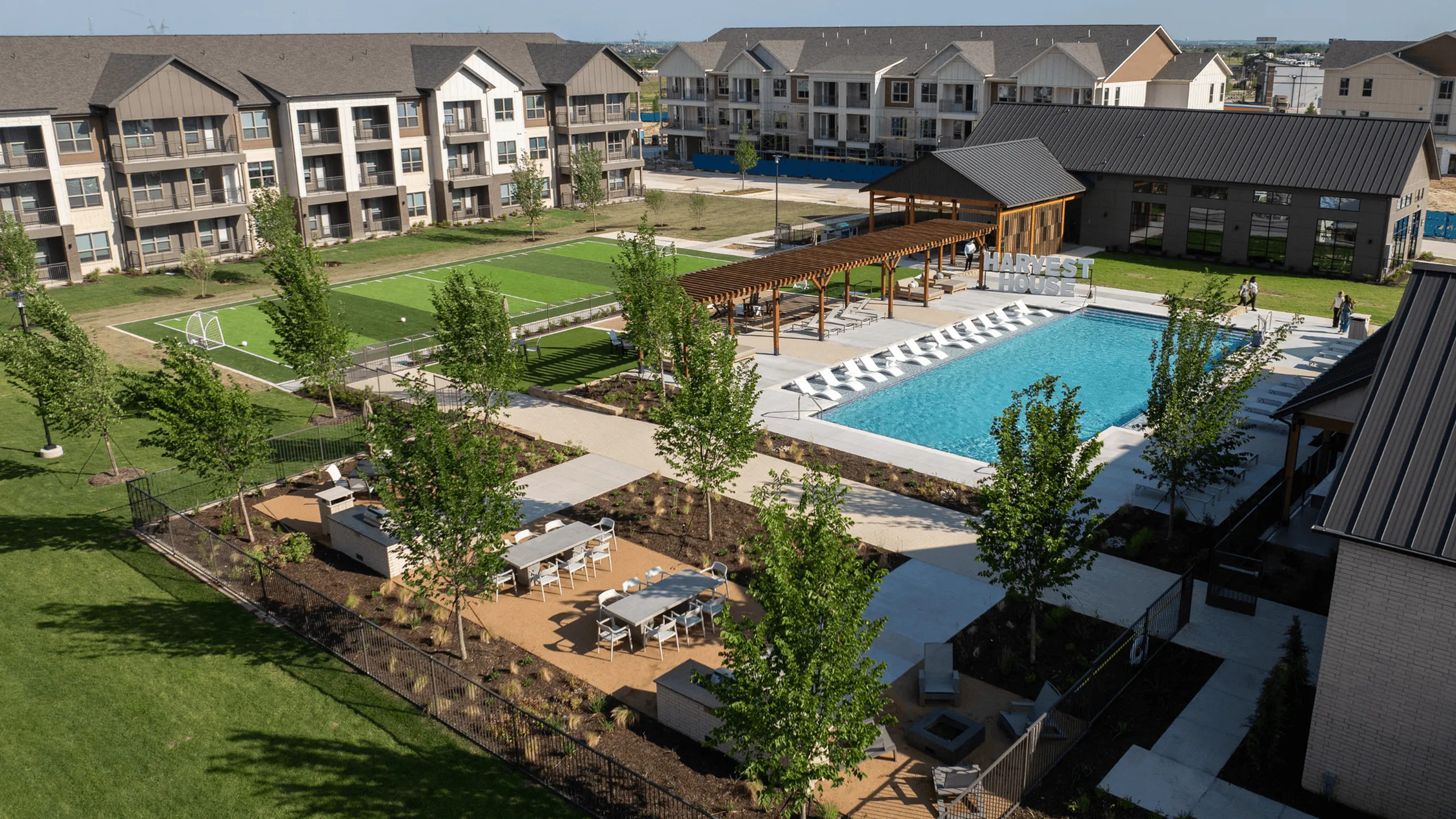 Harvest House Outdoor Resort Style Pool and Sports Field in Argyle, Texas