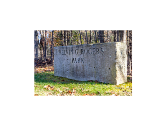 The large stone that is visible upon entry to the park. It is rectangular and reads Melvin G. Rogers Park
