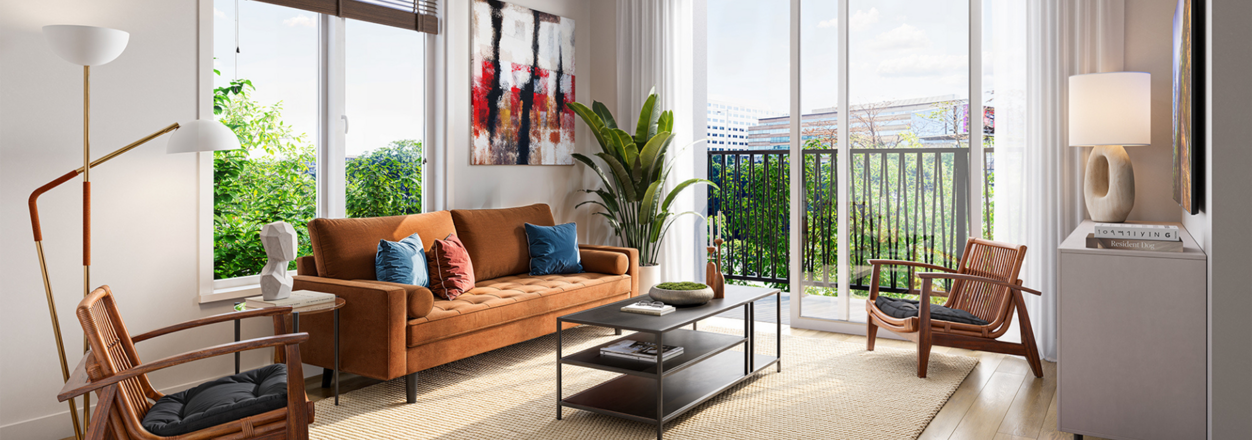 The Charley Apartments | Bright and stylish living room with modern decor, featuring a comfortable brown sofa, wooden chairs, and a lush view from the balcony. | Apartments for rent in Boston MA