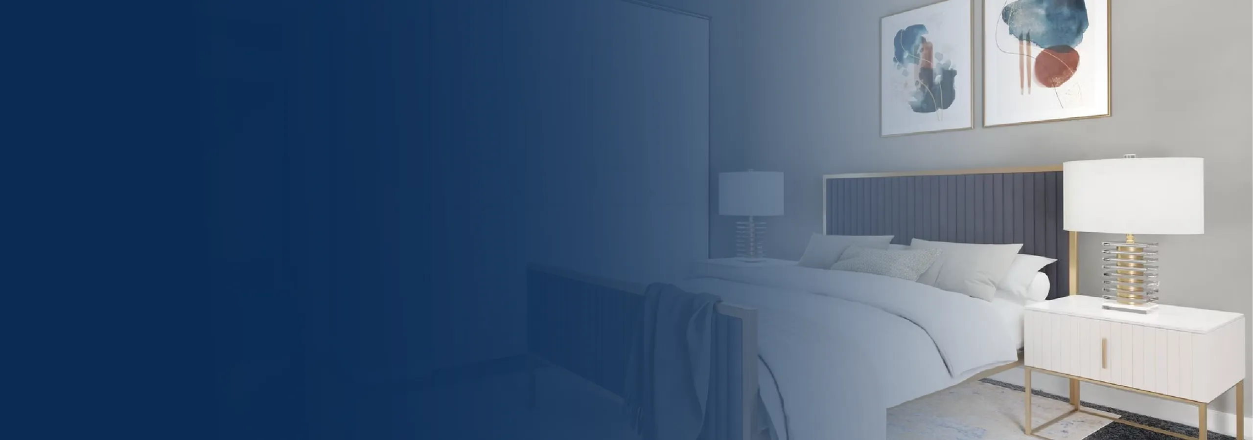 Elegant bedroom with modern decor, featuring a plush bed, stylish bedside lamps, and abstract wall art.