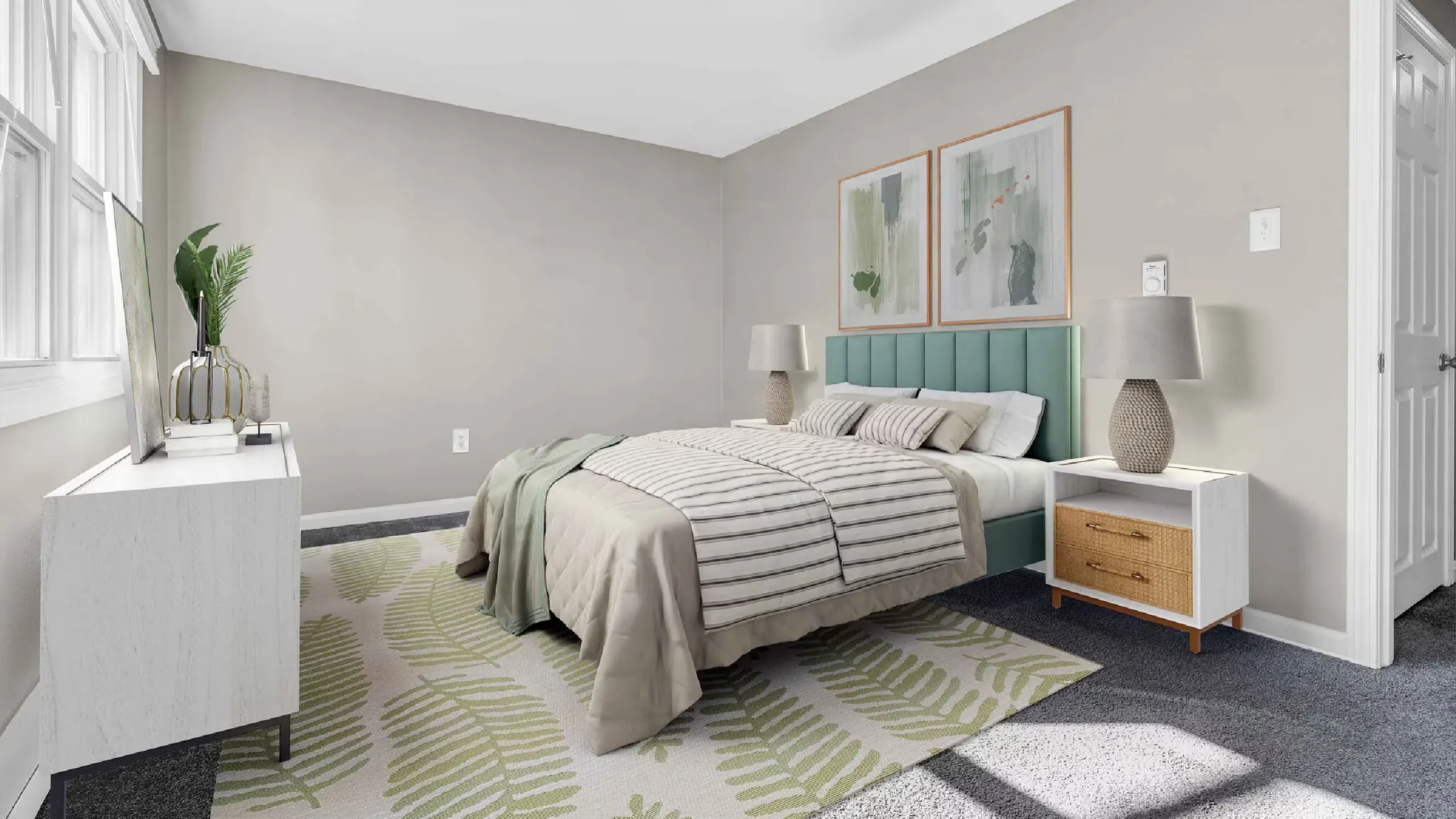Inviting bedroom with a plush bed, elegant decor, and abundant natural light, perfect for relaxation.