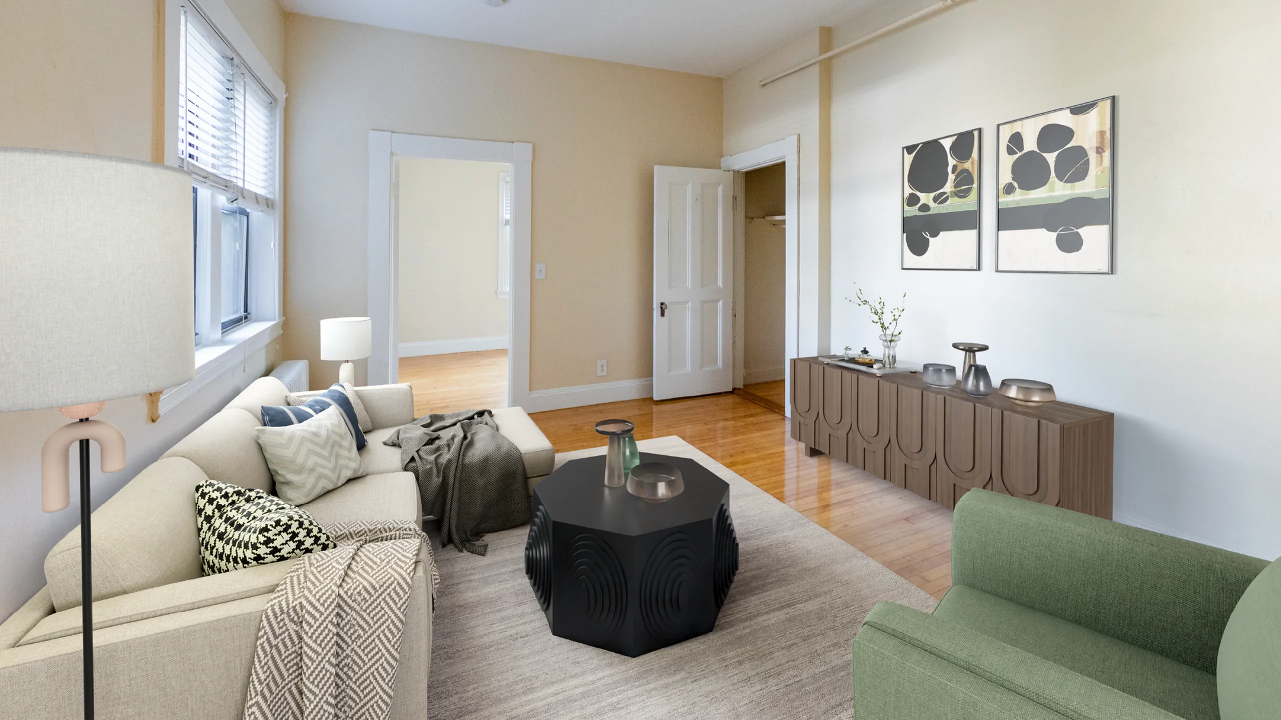 Chic living room with modern decor, a cozy sofa, stylish armchair, and unique coffee table, bathed in natural light.