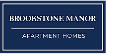 Elegant sign for Brookstone Manor Apartment Homes, showcasing a stylish and modern living community.