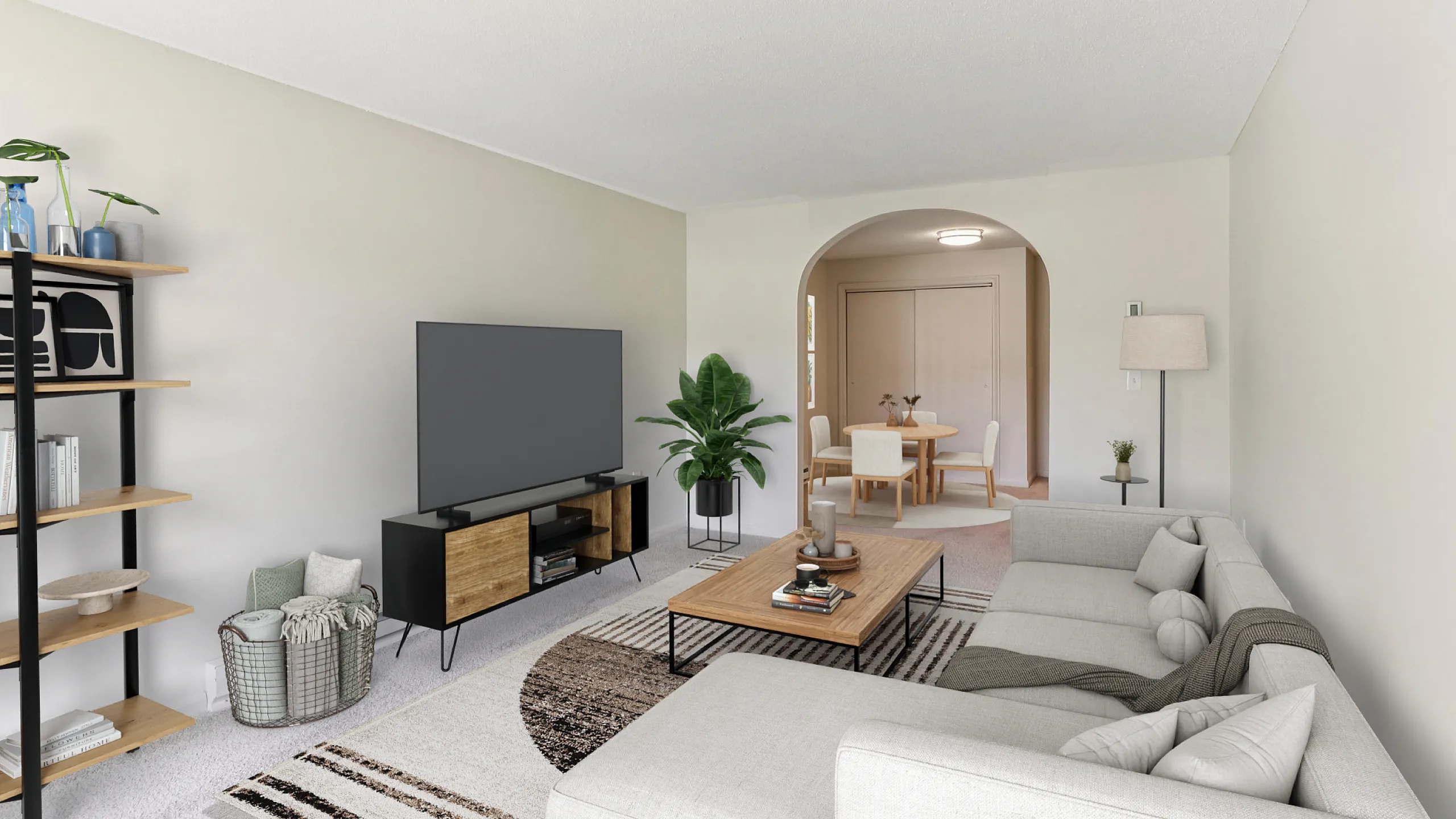 Inviting living room with cozy sectional sofa, modern TV stand, and elegant dining area, perfect for relaxation and entertaining.