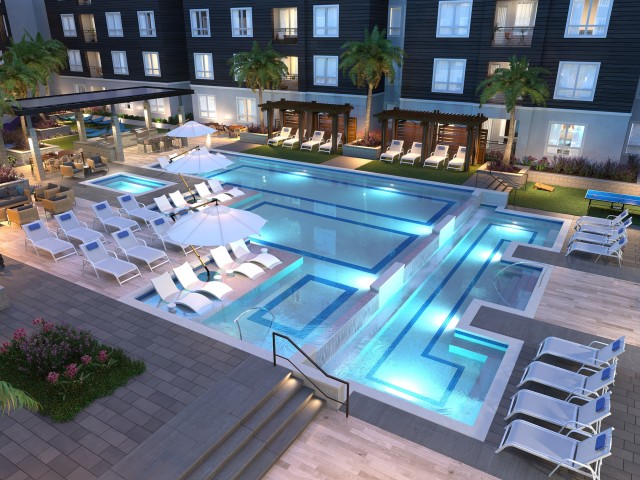 Image of Resort style two-tiered pool with in-water lounge chairs for Lark San Antonio