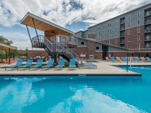 Image of Resort Style Swimming Pool W/Tree Houses for Latitude