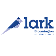 Bold and modern logo of Lark Bloomington at Latimer Square featuring a stylized bird design.