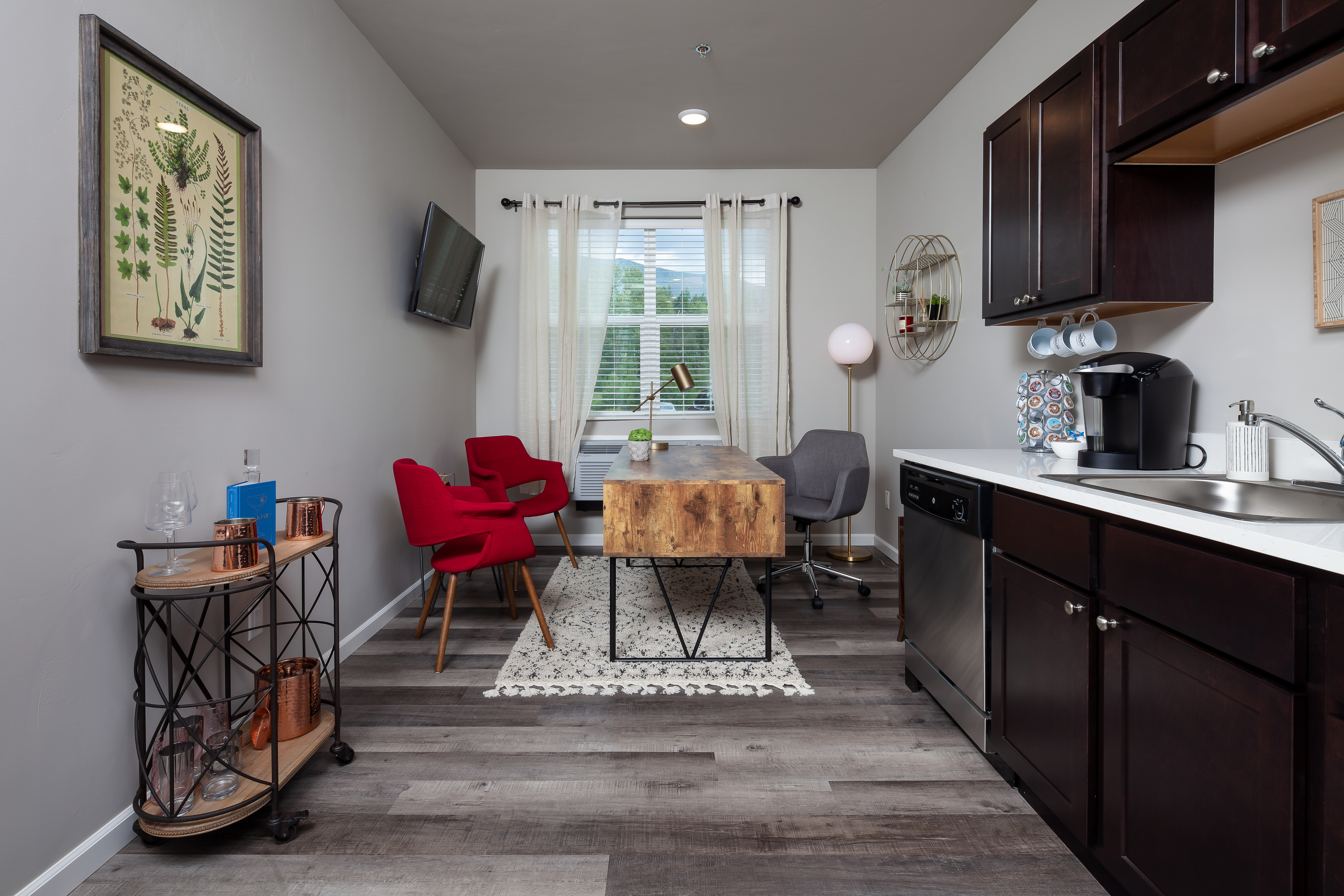 kitchen in studio apartment with desk