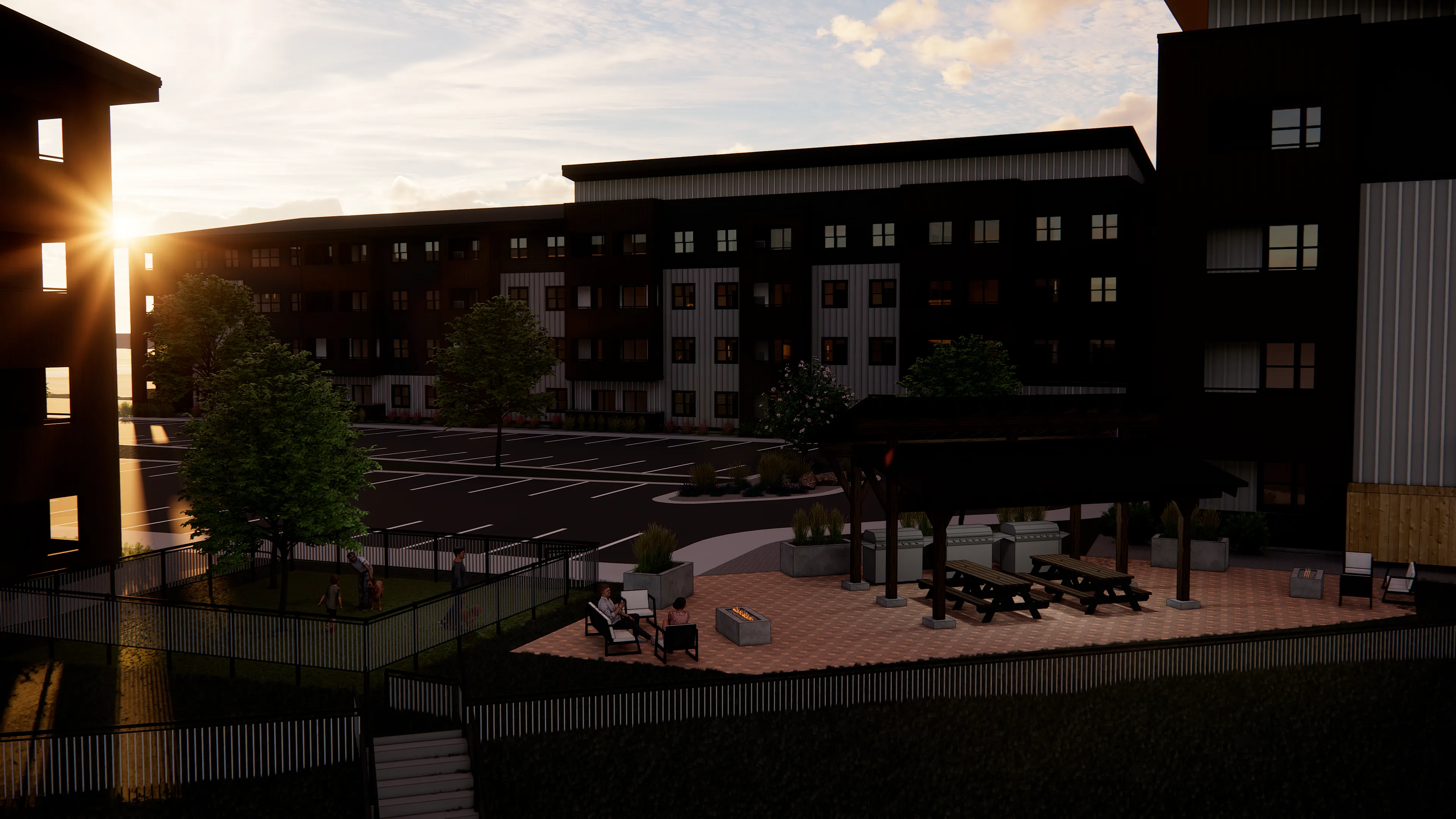 Charming apartment complex courtyard at sunset with inviting seating and greenery.