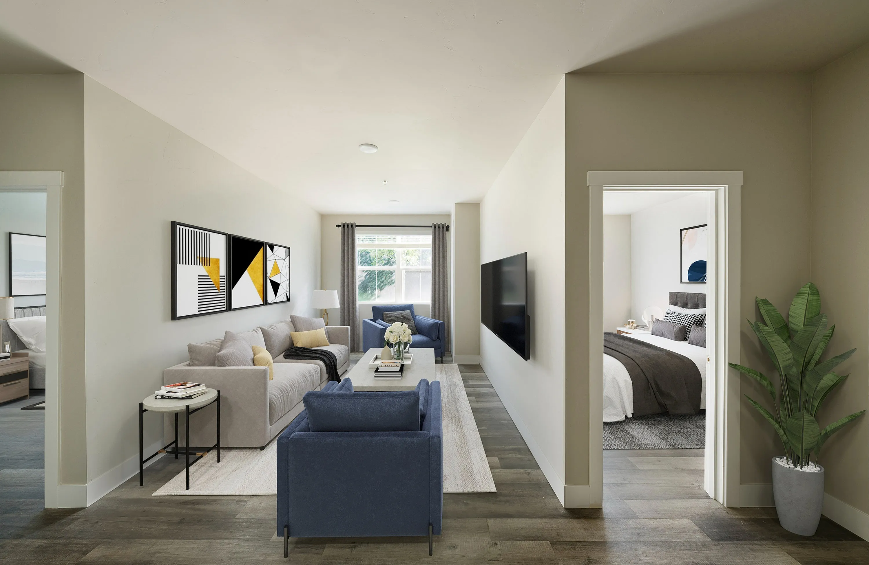 Modern apartment living room with stylish decor, featuring a cozy sofa, vibrant artwork, and a view into a chic, inviting bedroom.