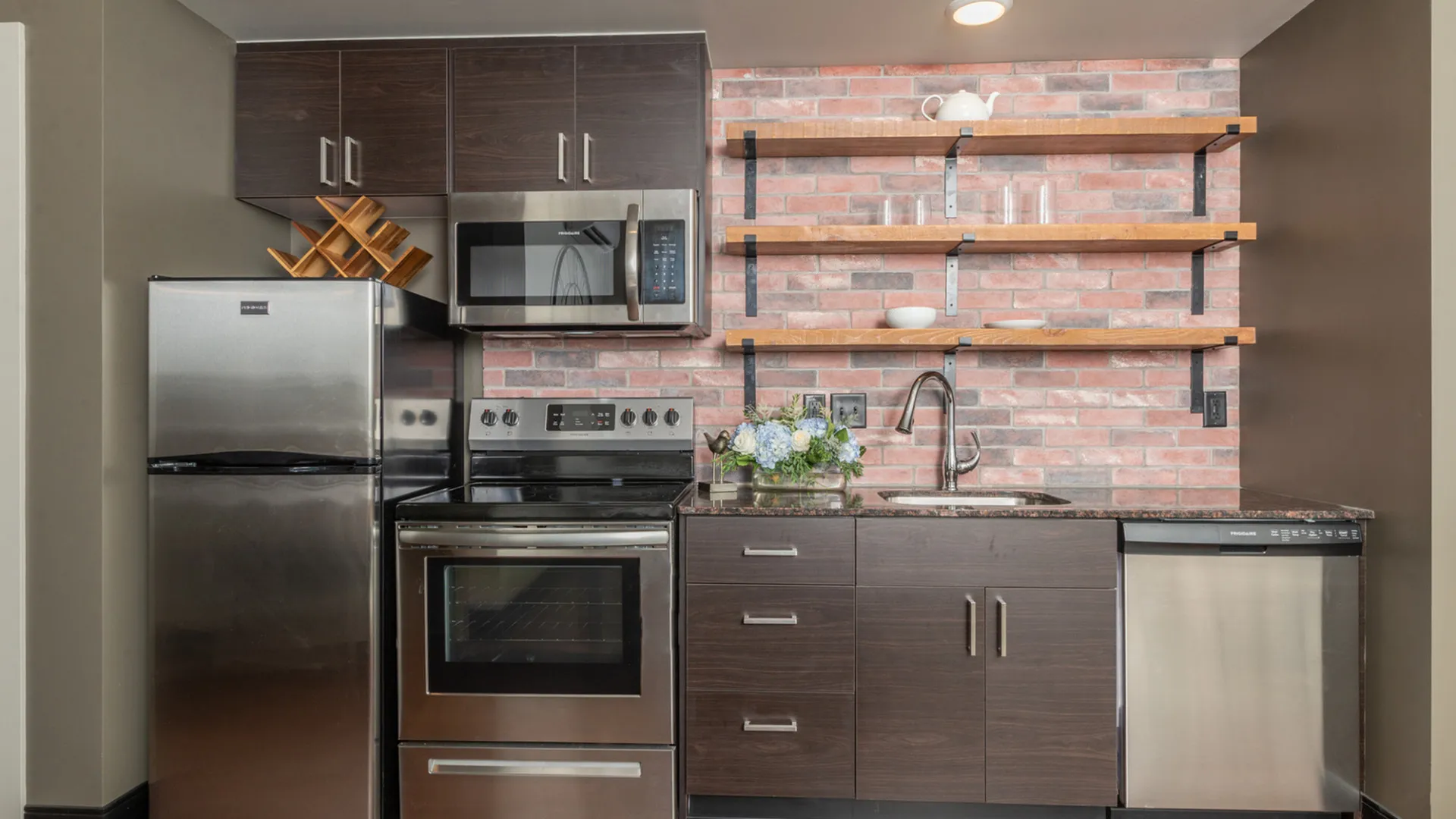 Galloway Creek Apartments kitchen with brick wall