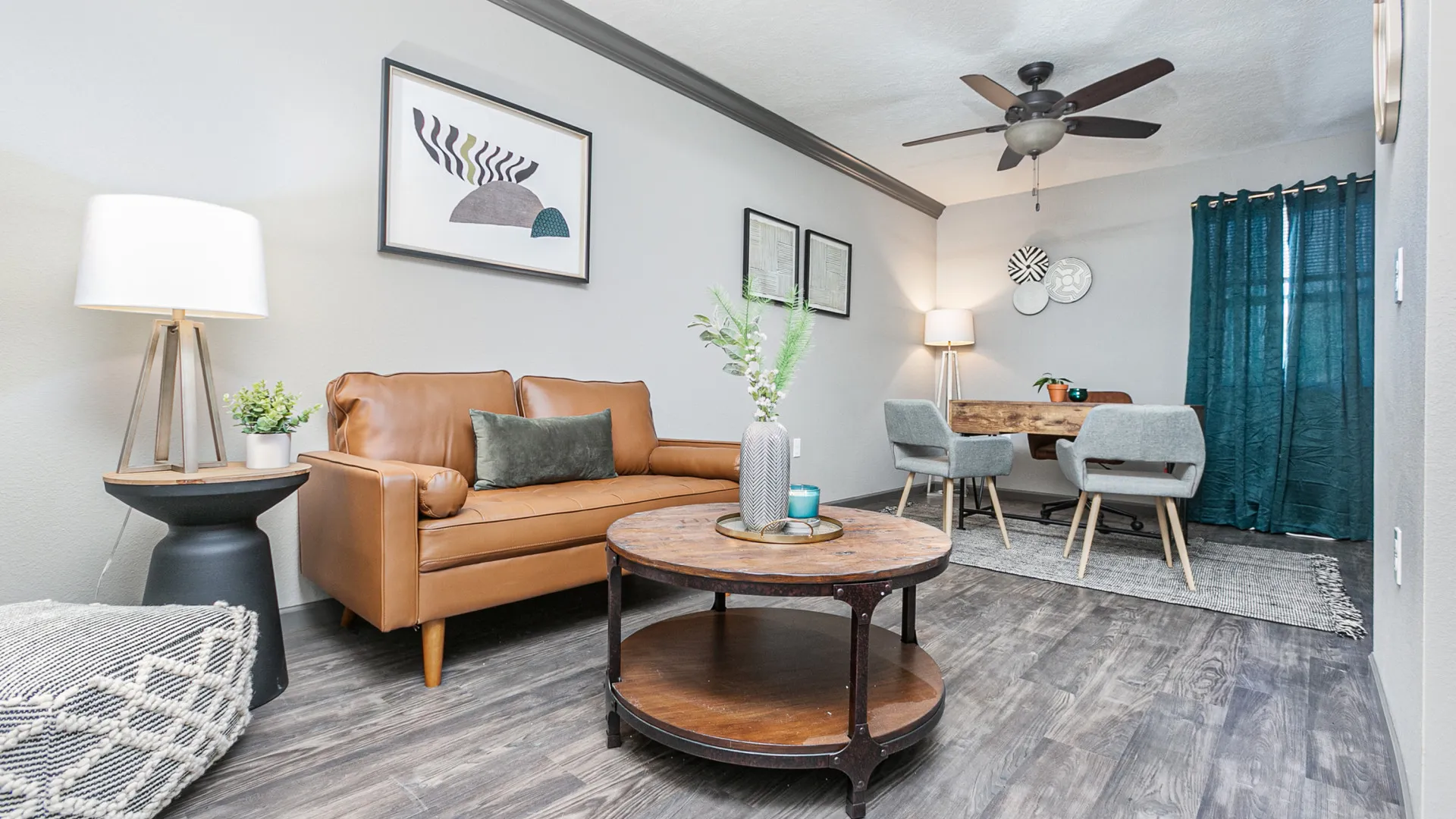 Northgate Apartments interior apartment with tan couch, desk and coffee table