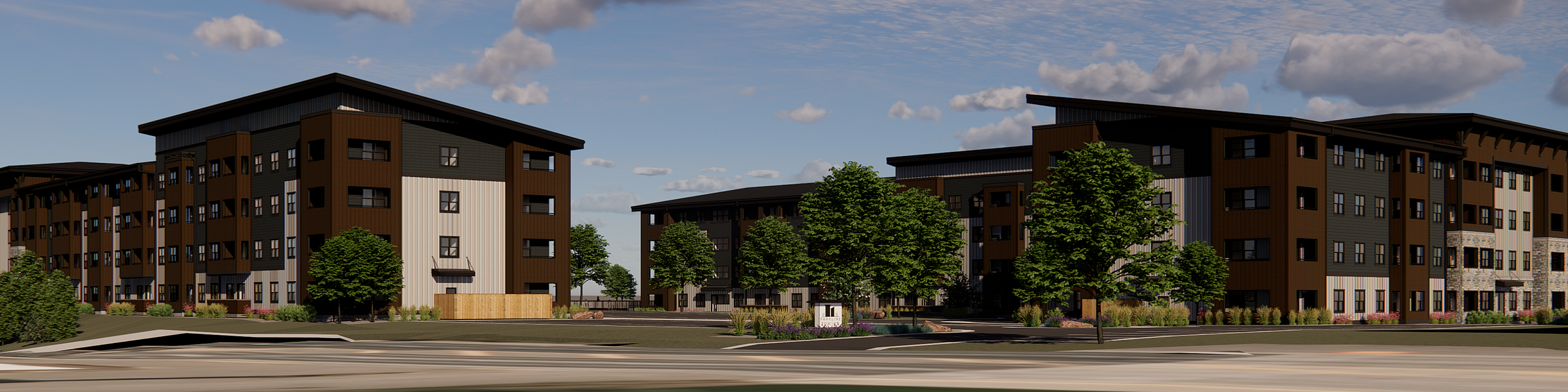 Modern apartment buildings with sleek architecture surrounded by greenery under a blue sky.