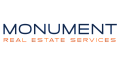 Monument Real Estate Services logo, sleek with navy and orange text, conveying professionalism and trust in real estate solutions.