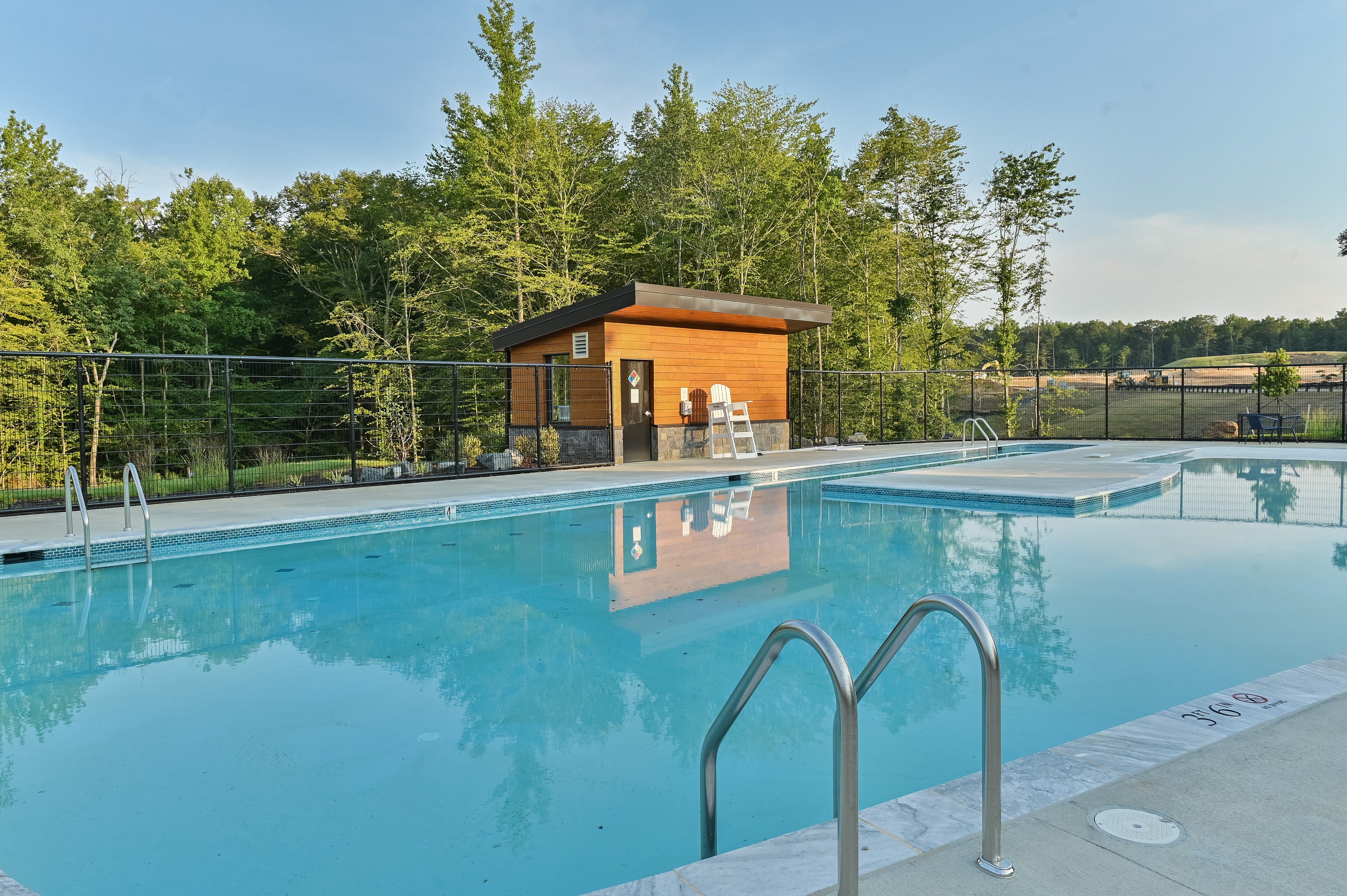 The Current at Watershed pool with diving board and fence - Laurel, MD