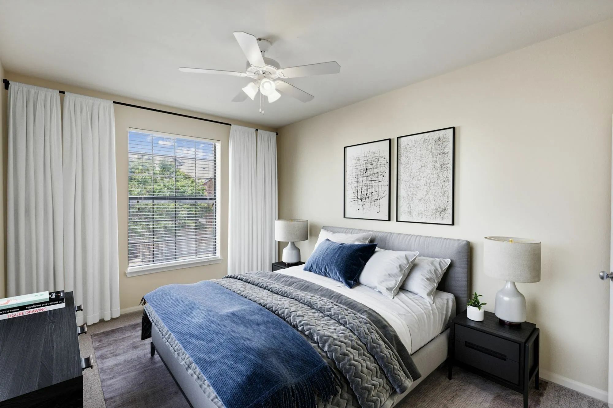 View of Enclave on Golden Triangle Bedroom with Bed, Side Tables, Lamps and a Large Window