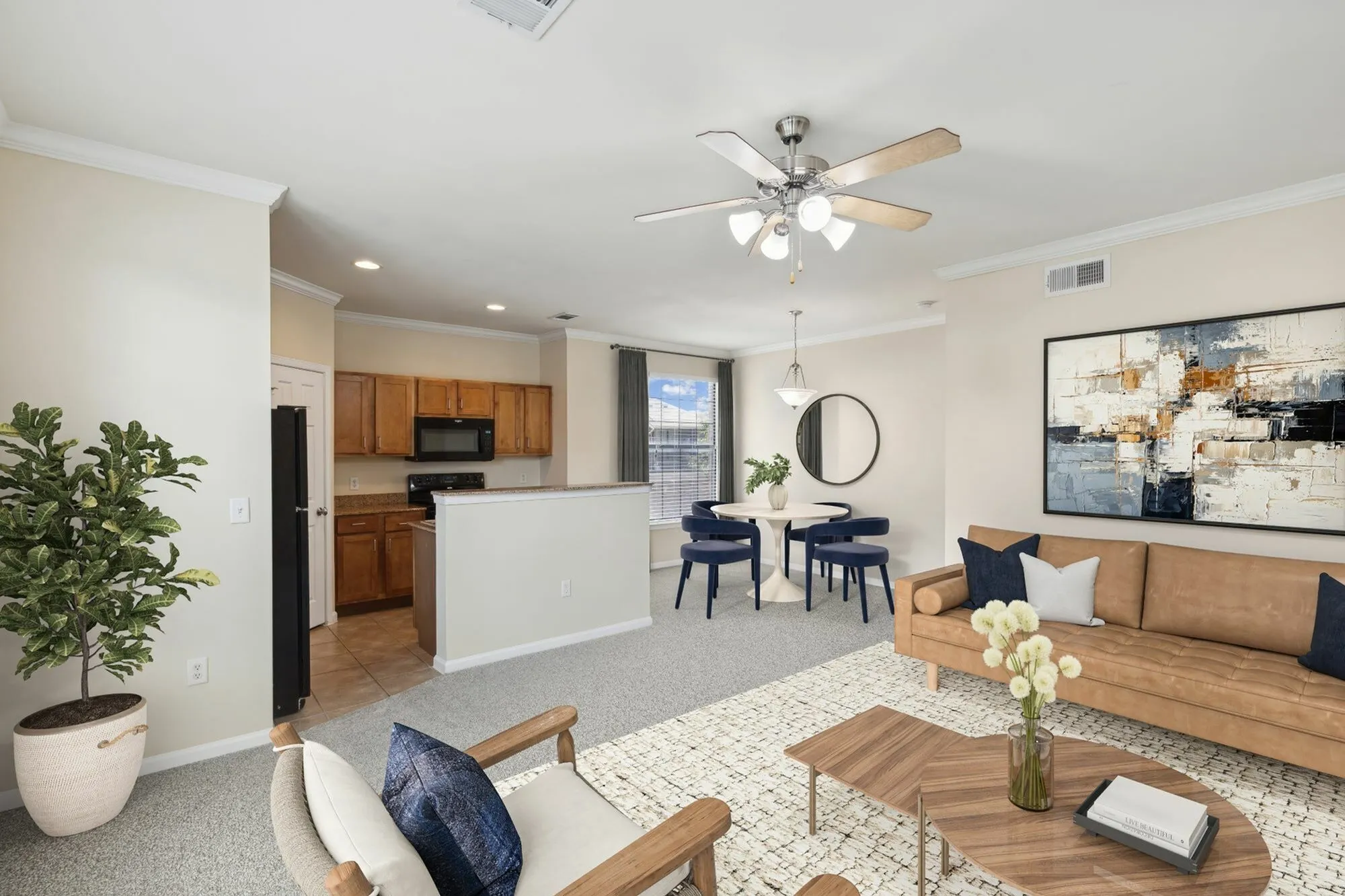 Enclave on Golden Triangle Open Concept Floor Plan with a view of the Kitchen, Dining Table Area, and Living Room