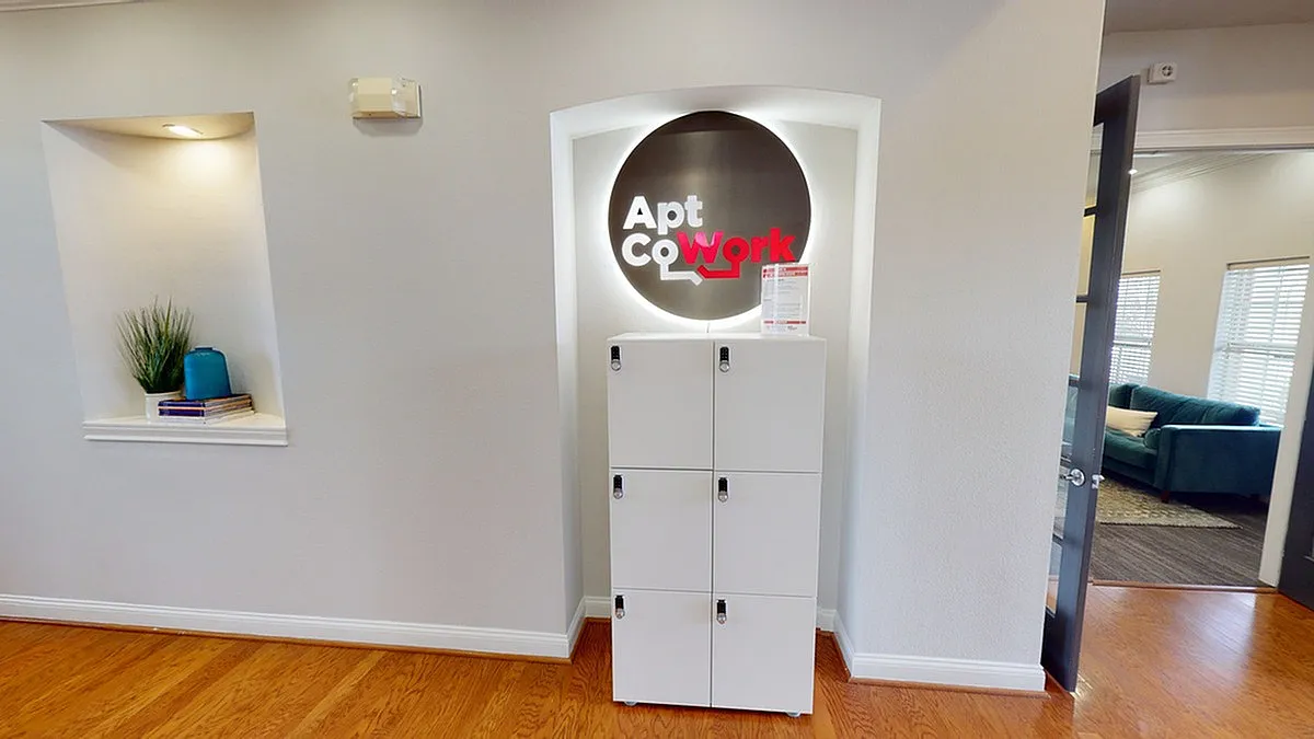 Apt CoWork at Cason Estates in Murfreesboro featuring sleek white lockers and inviting common area with stylish furnishings.
