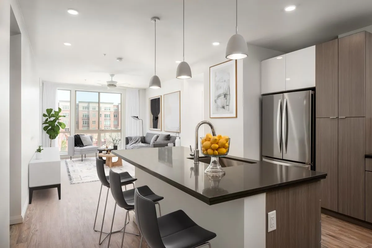 View of Kitchen Showing Living Room, Couches and City Views