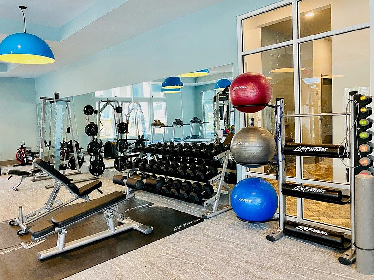 View of Cottonwood Clermont Gym Showing Free Weights and Smith Machine