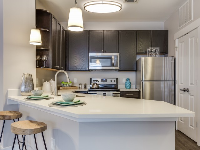 Apartment Amenity | Breakfast Bar | Granite Style Counters | Cottonwood Reserve Apartments