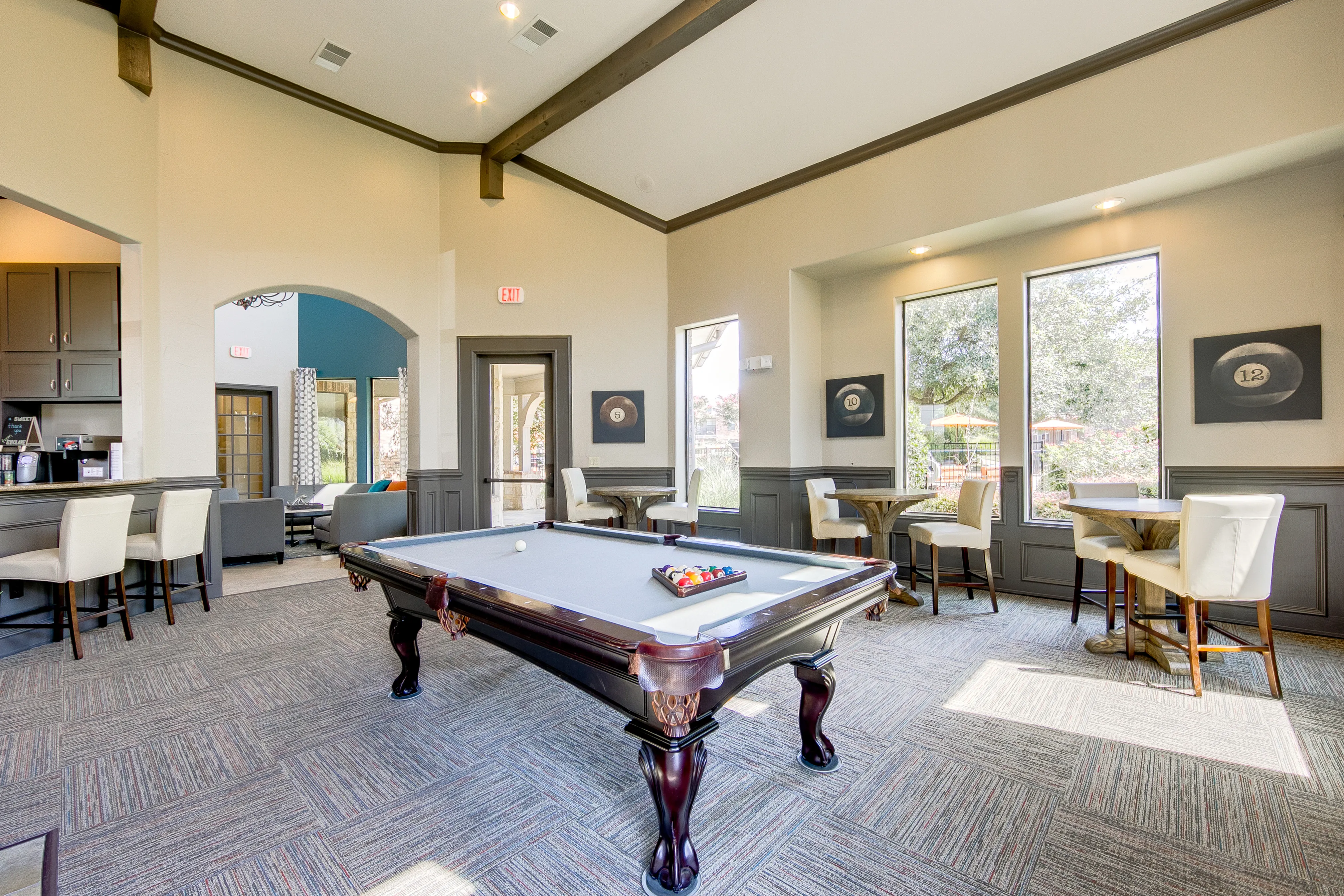 View of Billiards Room, Showing Pool Table, Coffee Bar, Tables and Chairs at Enclave on Golden Triangle Apartments
