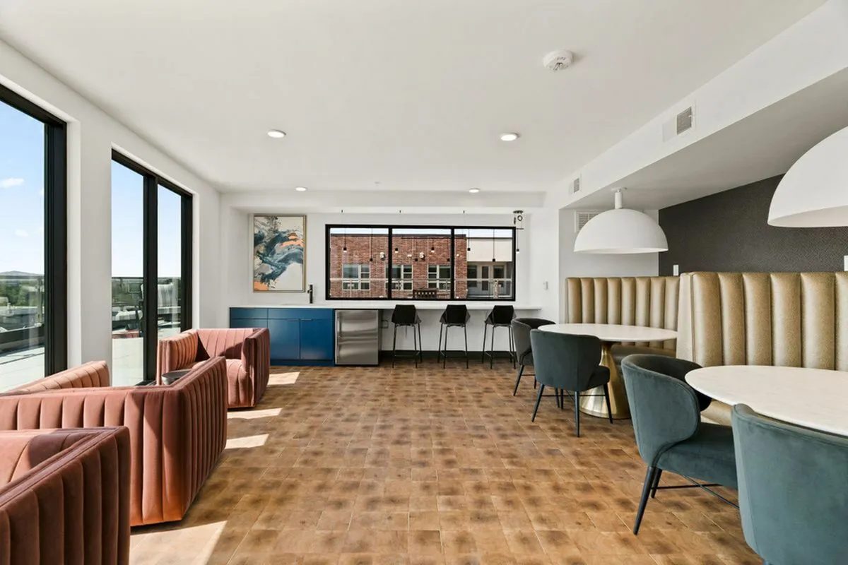 Bright communal space with modern seating, floor-to-ceiling windows, beautiful coworking space in Salt Lake City Utah