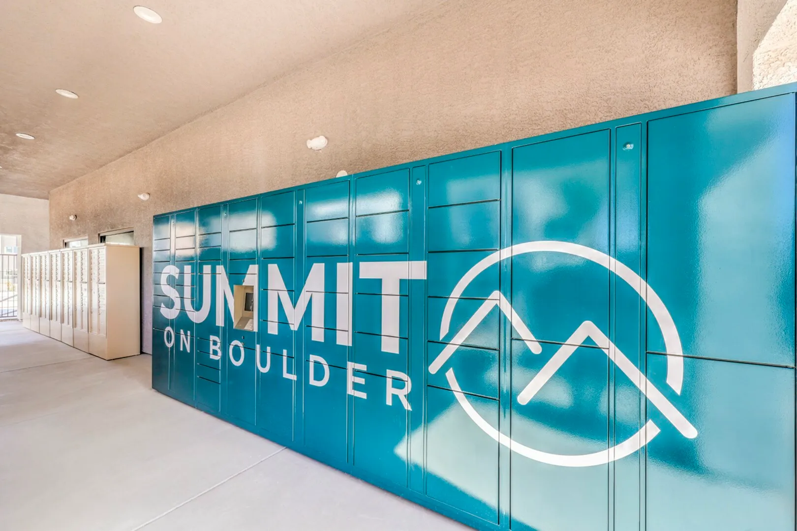Modern package locker system at Summit on Boulder, featuring sleek design and secure storage solutions.