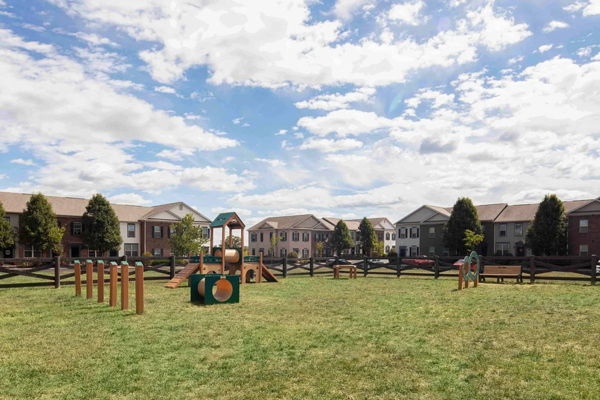 Charming residential area with modern townhouses and a well-equipped playground, perfect for families and outdoor enjoyment.