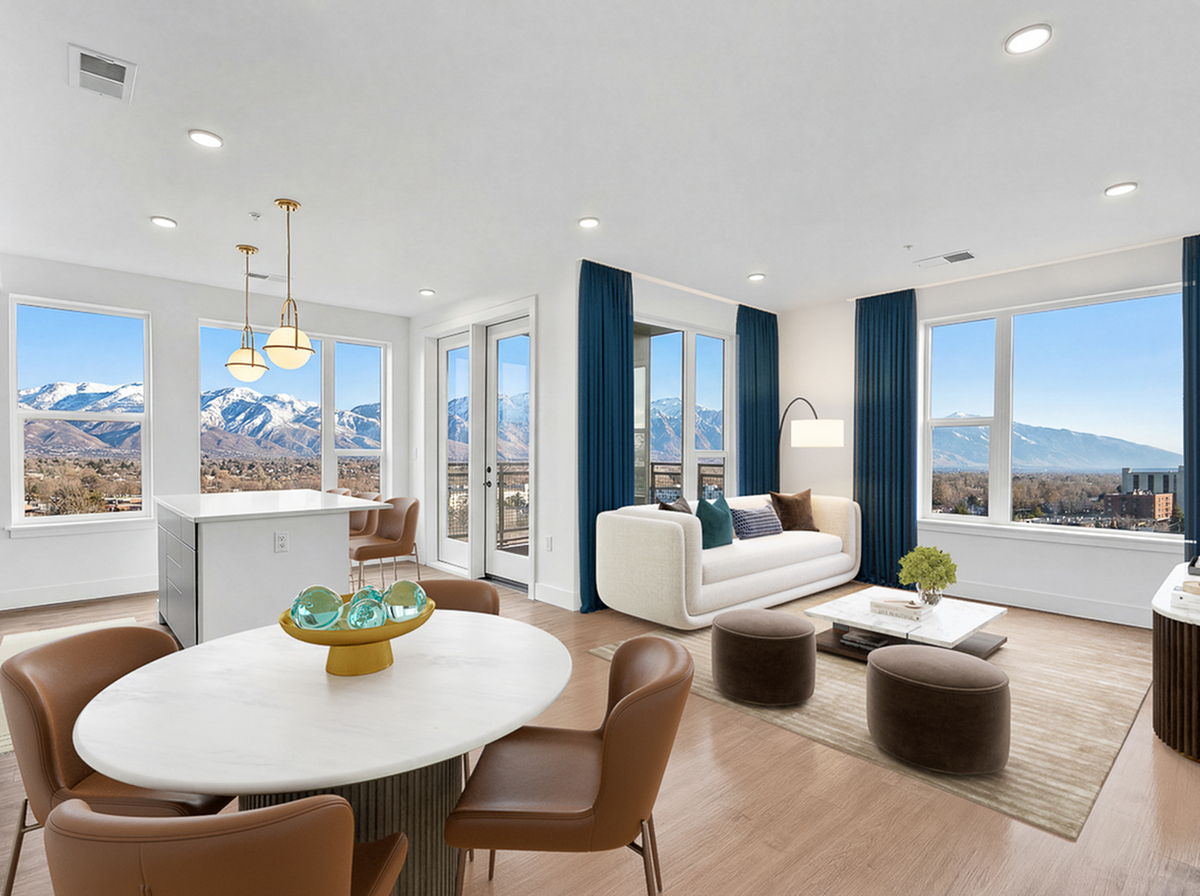 Luxurious open-concept apartment with panoramic mountain views, elegant dining area, and a cozy living room featuring modern decor and expansive windows.