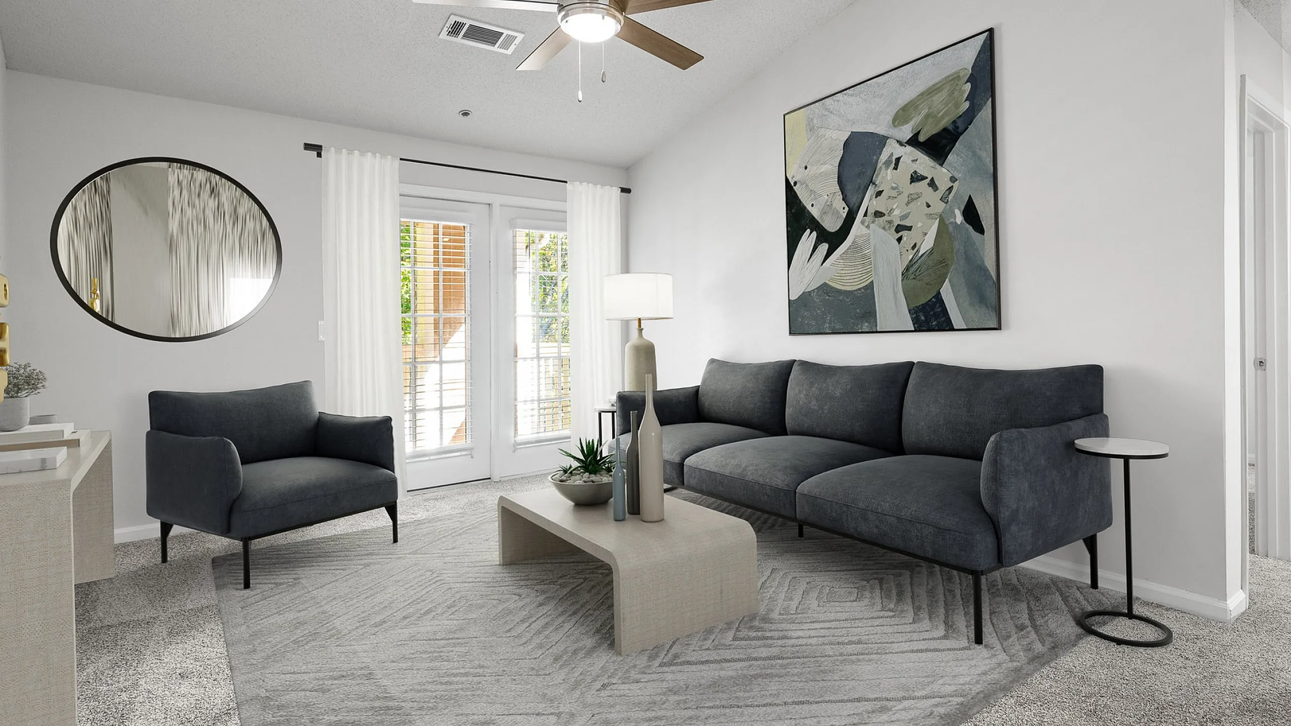 Chic and modern living room with elegant dark gray sofa, stylish armchair, plush carpet, and contemporary artwork, offering a perfect blend of comfort and sophistication.