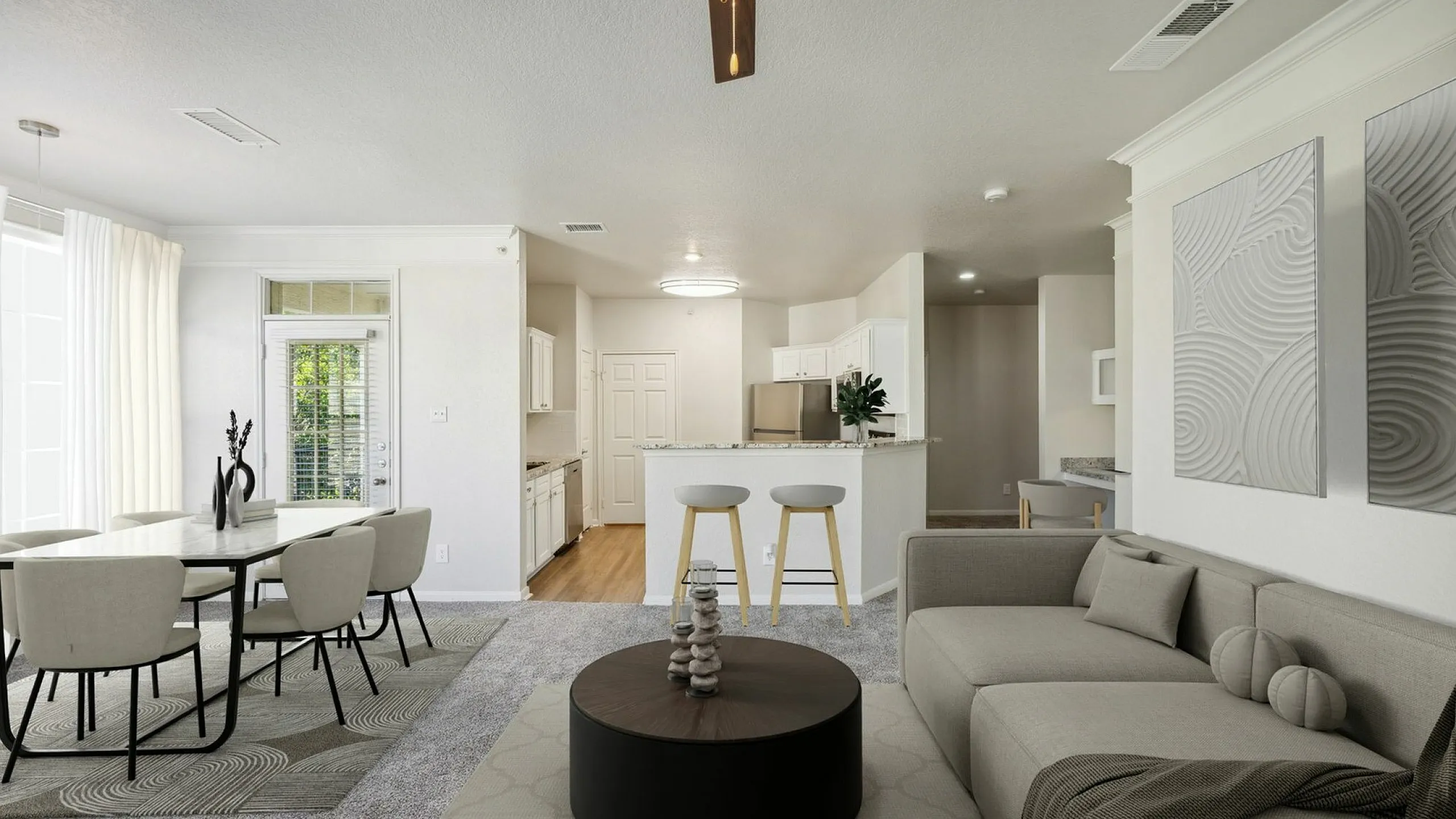 Elegant and modern open-concept living space featuring a stylish dining area, cozy seating, sleek kitchen with breakfast bar, and abundant natural light at Stonebriar at Frisco Apartments