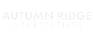 Autumn Ridge Apartments logo with bold white lettering on a transparent background, conveying modern elegance and style.