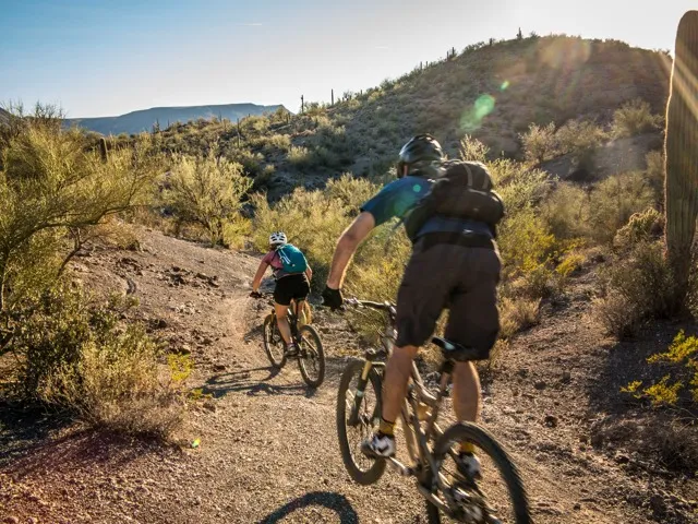 man in bike in desert landscape amavi aster ridge single family homes for rent in phoenix az