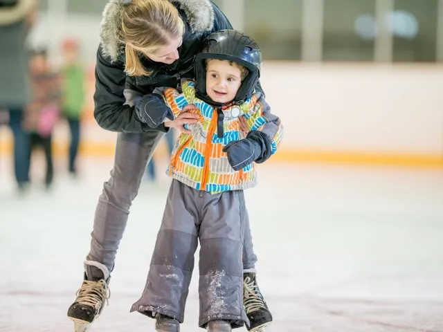 kid skating on ice rink modera northgate apartment homes for rent