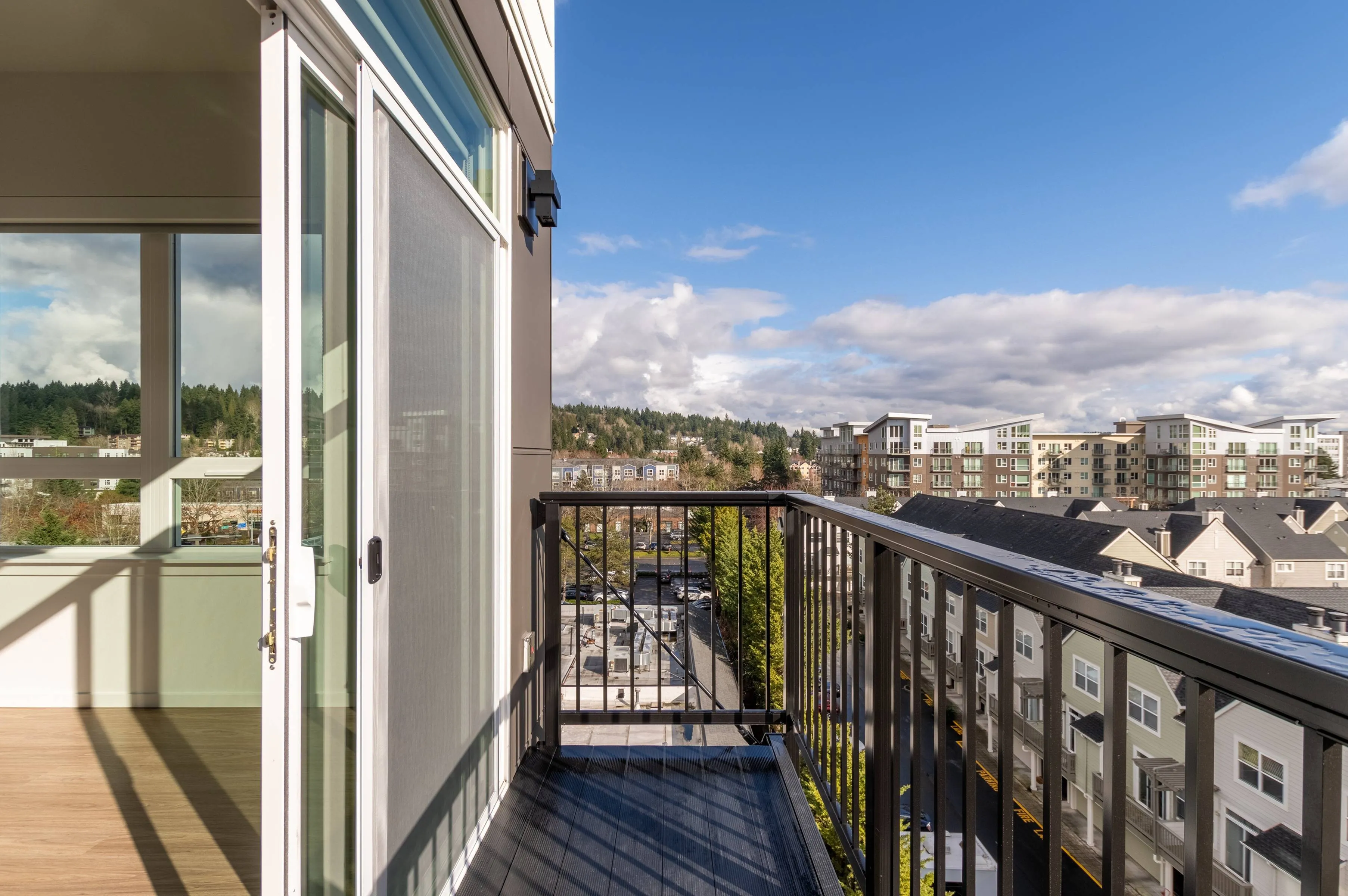 View from balcony looking into living room and out over Redmond area