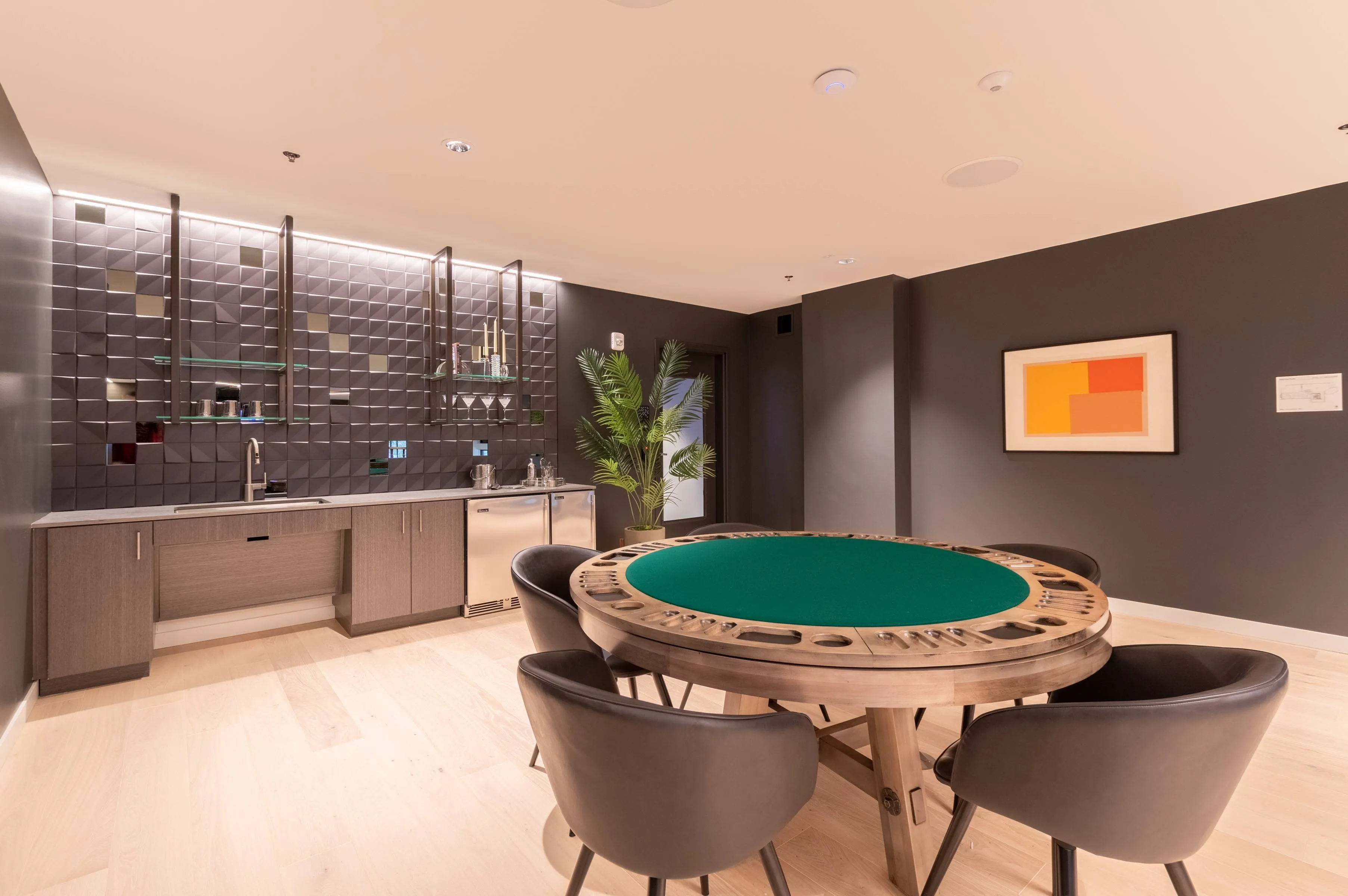 Poker and game lounge area with kitchenette