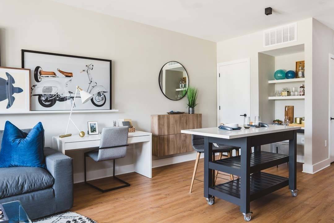 Moveable kitchen island in living room area