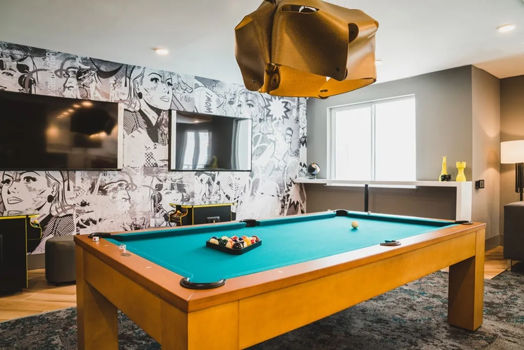 Image of pool table and entertainment space