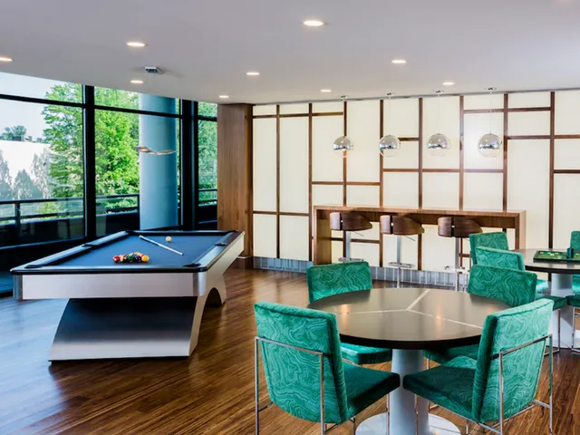 Resident lounge with billiards table and seating