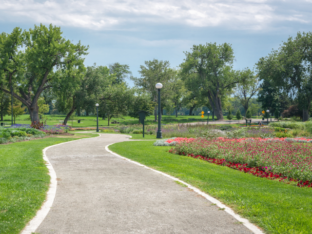 Outdoor image of flower garden and path for walking and biking